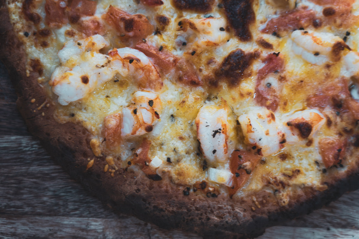 Pizza de pulpo y grelos de Galicia I.G.P.